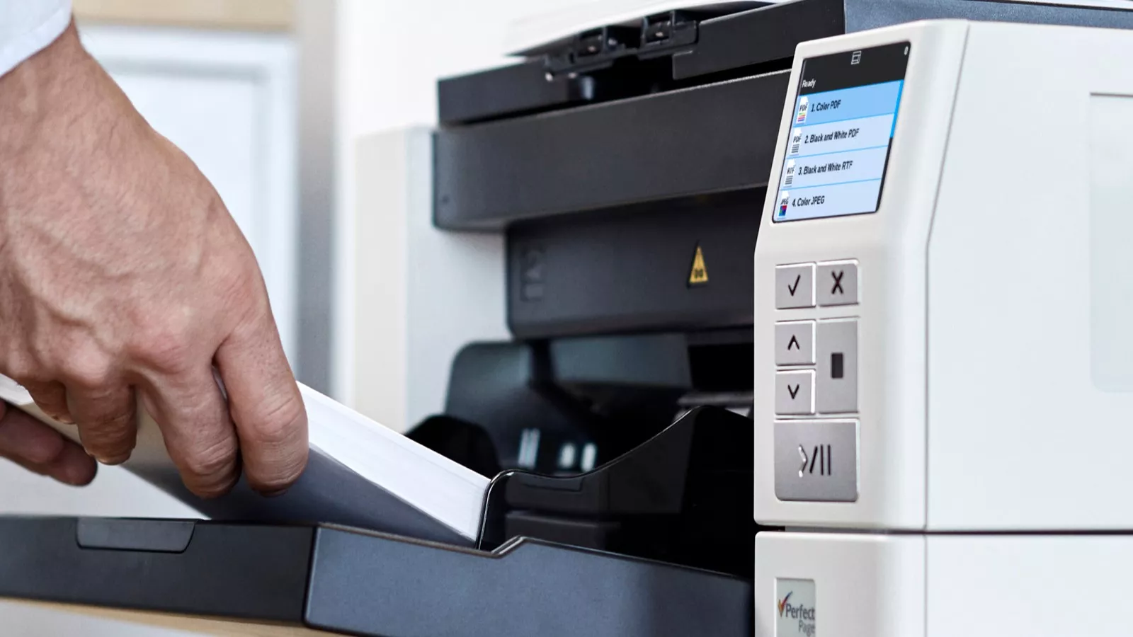 Paper being fed into a KODAK i4250 Scanner